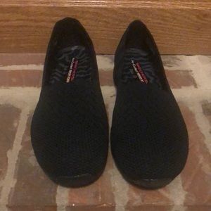 Black, textured, sketchers flats